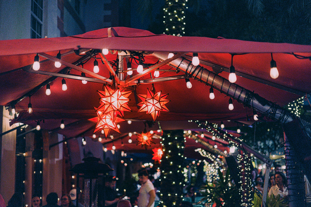 Festive night market with star lanterns and string lights